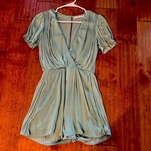 Romper, small, open slit back with zipper.